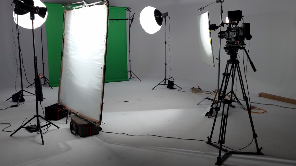 Professional video production setup compared to phone filming in Auckland