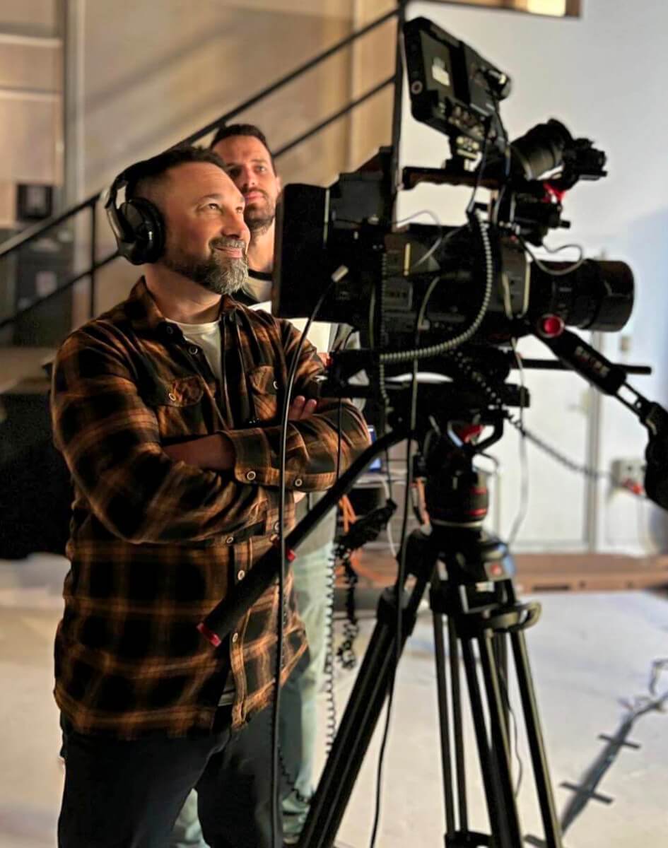 Diego Opatowski filming an interview on location in Auckland